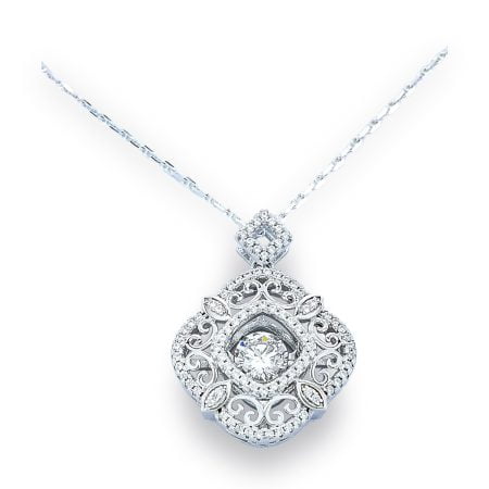 Dancing Diamond center stone surrounded by cushion shaped filigree design with inner and outer border of single row of round CZs with square shape bale