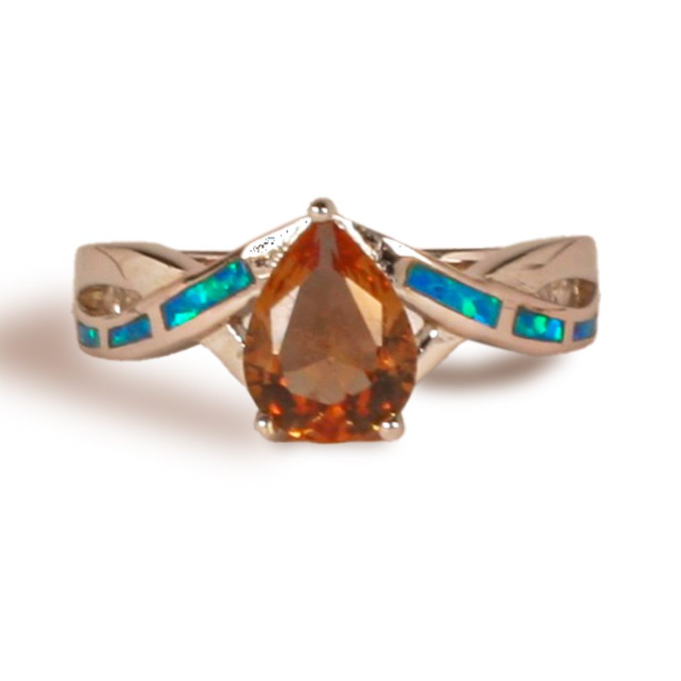 Prong set with criss-cross design shank with three thin opal sections on one portion of criss cross on each side of center stone