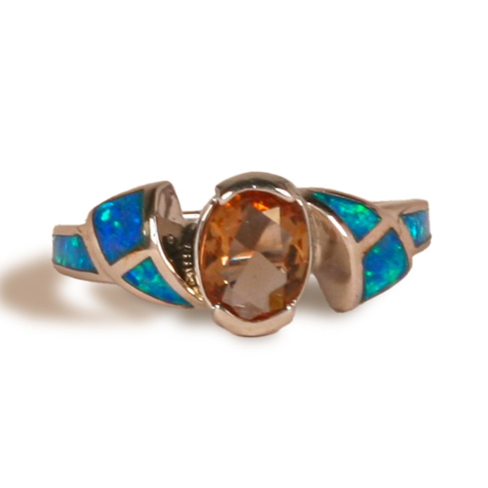 Half-bezel set with staggered “fin” shaped design on each side of center stone with two triangle shaped opal sections in each fin with long opal section down side of shank